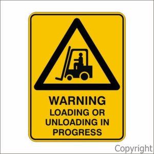 Warning Loading Or Unloading In Progress Sign