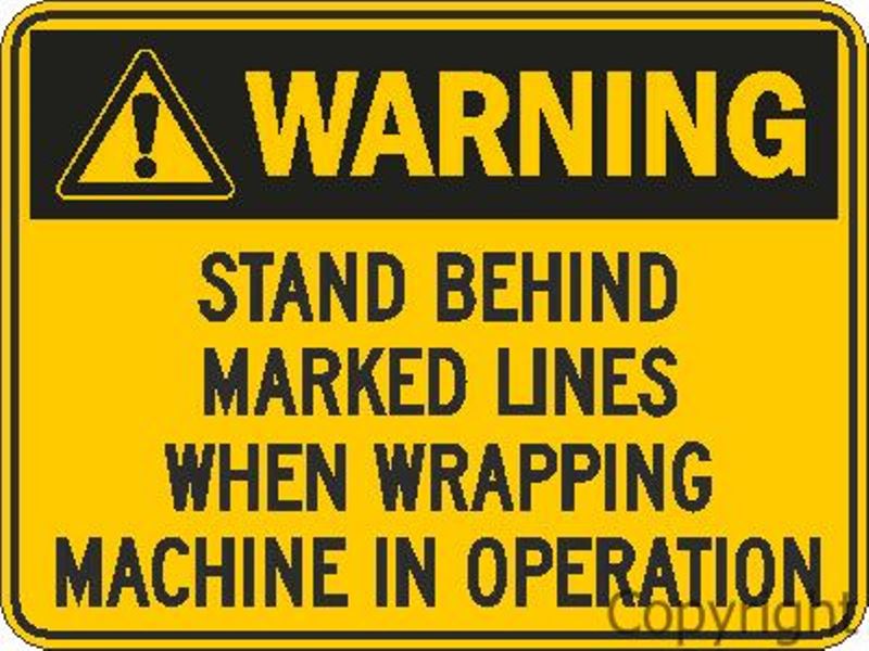 Warning Stand Behind Marked Lines etc. Sign